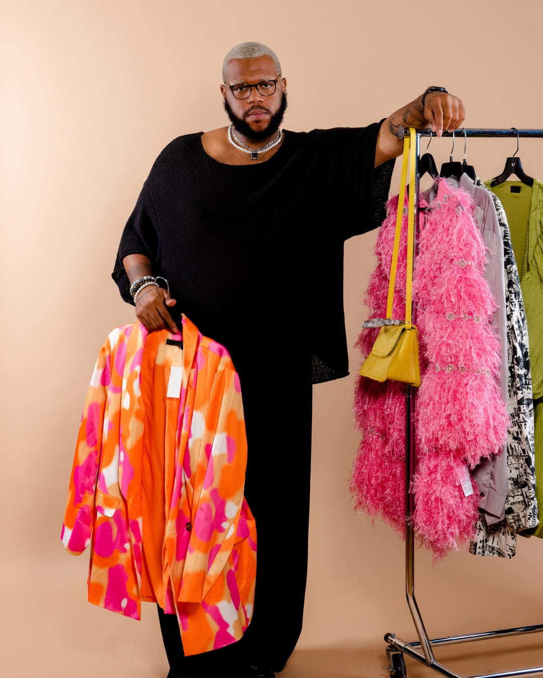 Stylist with clothing rack